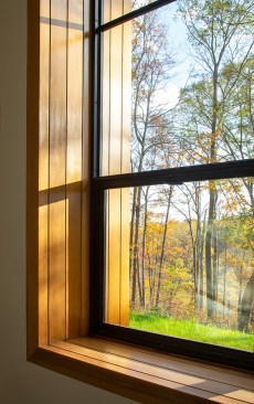 Subtle design details like carrying the window cladding material inside reinforce the connection between interior and exterior.
