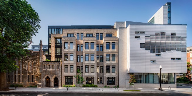 The residential building incorporates part of the remaining Parish Hall and connects to St. Thomas along Church Street.