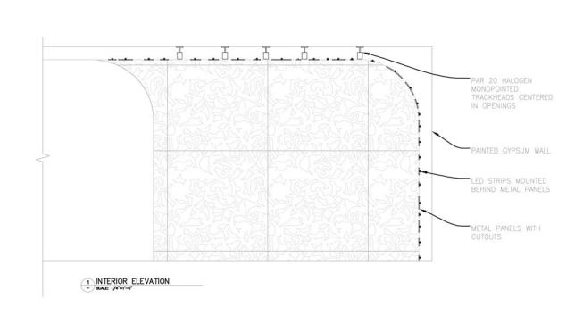 The complexity of the design concept required the use of long life, low maintenance, and cost effective sources. This detail shows how the layers of light work within the spaces. The intricate space benefits from having all the light fixtures concealed from direct view. The metal panels curve around the space and the LEDs are mounted behind the panels. Mono-point mounted PAR20 track heads aim down to highlight the tables. 