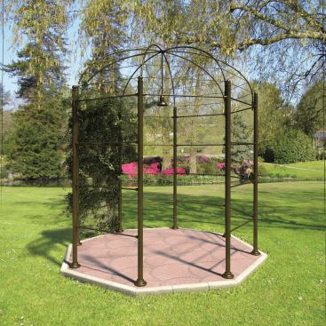The Stardome gazebo's aged-brass poles are connected by aged-brass tubing. A central pendant light illuminates the free-standing, 9-foot, 10-inch diameter area. The gazebo is 10-feet, eight-inches tall.
