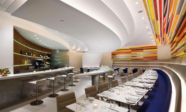 Sculptural forms create a flared ceiling.