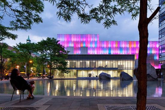At night the façade comes to life via the portion of the façade: programmable LED backlit panels that change color.