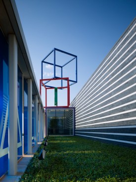 Main entry detail with colored glass and sculptural blocks