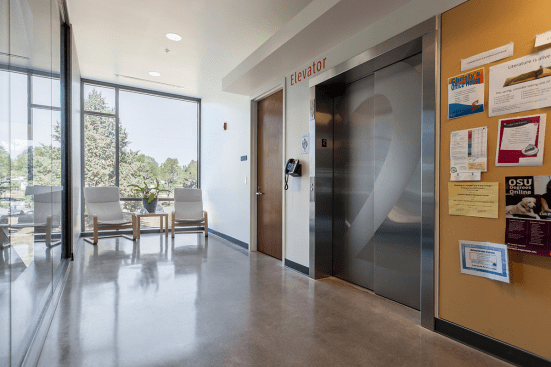 Stainless Steel Elevator Doors in Satin finish with custom Eco-Etch pattern at Clackamas Community College - Harmony Campus, Milwaukie, Oregon