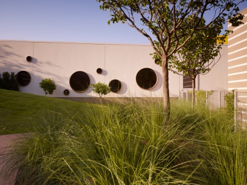 North courtyard looking South towards ramp enclosure with circular windows