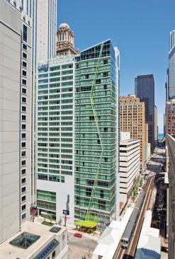 Located on a 9,500-square-foot corner site in Chicago?s central Loop, the Wit hotel is most easily identified by the chartreuse lightning bolt worked into its 27-story glass fa?ade. Lured by the possibilities of the hip theater-district location?so much so that the developers, ECD Co., commissioned a robotic helicopter to take photographs of the site even before the design began to take shape?the hotel?s parent company, Doubletree Hotels, decided to take a design approach akin to that of a boutique hotelier.
