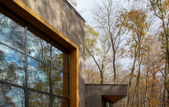 STK cedar highlights window carvings into the building.
