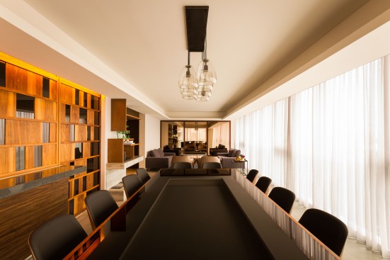 The ZE project shows an absolute sobriety that is expressed in its palette of colors and materials. Grey and wood tones, achieves a synergy between the finishes and the furniture. Each space at the apartment is designed with a unique character and for a specific function.

The kitchen is designed with stylized sliding doors that allow both, to keep it hidden or relate it to the dining room.

In the living room, the TV screen is hidden behind some elegant framed mirrors; the area relates naturally with the dining room. The breakfast room is located next to the family room because of the idea of maximizing spaces creating a cozy family area. 

The bedrooms are located in the private area of the apartment; the main room takes advantage of one of the walls to use it as a headboard, achieving a sense of breadth and depth in the space.

The apartment is a project with subtle details, from the furnishings to lighting, manages to convey its main essence: sobriety and elegance.
The ZE project shows an absolute sobriety that is expressed in its palette of colors and materials. Grey and wood tones, achieves a synergy between the finishes and the furniture. Each space at the apartment is designed with a unique character and for a specific function.

The kitchen is designed with stylized sliding doors that allow both, to keep it hidden or relate it to the dining room.

In the living room, the TV screen is hidden behind some elegant framed mirrors; the area relates naturally with the dining room. The breakfast room is located next to the family room because of the idea of maximizing spaces creating a cozy family area. 

The bedrooms are located in the private area of the apartment; the main room takes advantage of one of the walls to use it as a headboard, achieving a sense of breadth and depth in the space.

The apartment is a project with subtle details, from the furnishings to lighting, manages to convey its main essence: sobriety and elegance.

The ZE project shows an absolute sobriety that is expressed in its palette of colors and materials. Grey and wood tones, achieves a synergy between the finishes and the furniture. Each space at the apartment is designed with a unique character and for a specific function.

The kitchen is designed with stylized sliding doors that allow both, to keep it hidden or relate it to the dining room.

In the living room, the TV screen is hidden behind some elegant framed mirrors; the area relates naturally with the dining room. The breakfast room is located next to the family room because of the idea of maximizing spaces creating a cozy family area. 

The bedrooms are located in the private area of the apartment; the main room takes advantage of one of the walls to use it as a headboard, achieving a sense of breadth and depth in the space.

The apartment is a project with subtle details, from the furnishings to lighting, manages to convey its main essence: sobriety and elegance.
Apartment ZE by Kababie Arquitectos
