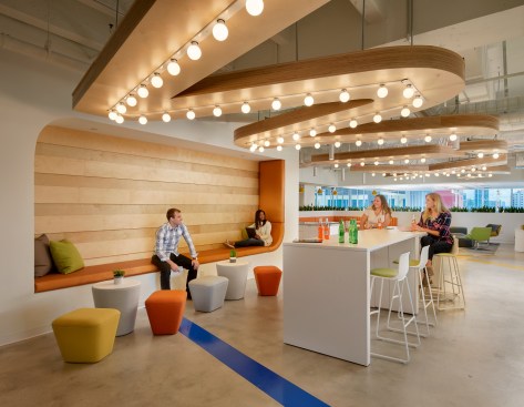 A fun ceiling light feature in the employee lounge. boasts the Wix logo.