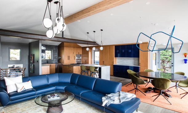 Vibrant colors are everywhere, yet balanced with the neutral feel of the counters and natural teak cabinets. They demand attention but never overwhelm.