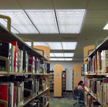 Old fluorescent tubes were replaced with energy-conserving LED tubes. New high-efficiency ballasts had to be installed, but that allowed the library to keep the existing fixtures and light boxes and minimize the upgrade cost.  