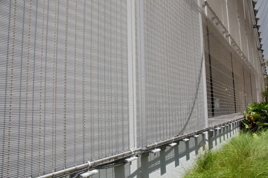 The design is a modern riff on a wave pattern and incorporates
signature elements of the barrier island onto the screen wall