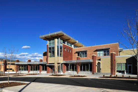 Durango Public Library-Durango, CO In 2005 Barker Rinker Seacat and DHM Design were selected to develop a conceptual master plan for the existing Mercy Medical Center site in downtown Durango to refine placement of a new main library and determine long-term use and development of the entire parcel. Extensive public workshops were held to build a community vision for the library, resulting in a building program of 42,800 square feet. Durango Public Library incorporates a promenade, connecting the entry to the river patio and upstairs mountain overlook while bringing daylight to the interior spaces. Key features include a raised floor system throughout for flexibility, automated book handling system, self check, caf&eacute;, cozy lounge, outside program and reading patios, homework center, Internet access and public meeting spaces. 
Architect: Barker Rinker Seacat Architecture