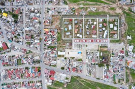 Aerial view of the Apan Housing Laboratory, which was master planned by MOS. The welcome and education center designed by MOS is at the base of the site, adjacent to 32 affordable house prototypes, each designed by a different firm.