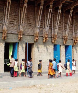 Bangladesh

School in Rudrapur, Dinajpur, Bangladesh, 2005 (Anna Heringer and Eike 
Roswag) Hand-built in four months, the two-story primary school combines
 earthbound materials like loam and straw with bamboo sticks and nylon 
lashing.