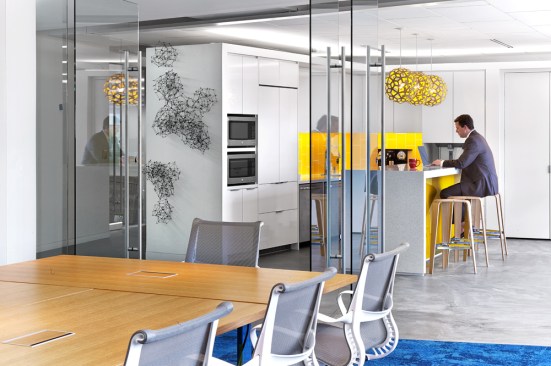 Abundant daylight and glass divider walls provide a bright, comfortable space for employees throughout the day. 