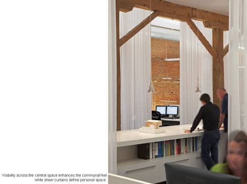 Visibility across the central space enhances the communal feel while sheer curtains define personal space