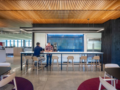 Woven throughout the interiors, the application of primary colors plays a key role in defining space with Blue Heath Tile utilized to mark pantry spaces.