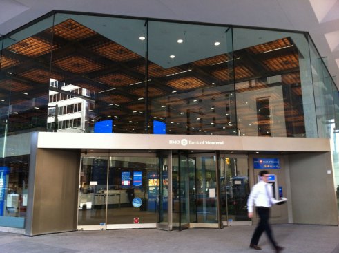 A view of the bank, prior to renovation, with the old fluorescent lighting system in the ceiling.