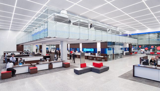 The renovation maintains the existing 10-foot-by-10-foot architectural grid in the 27-foot-high ceiling and provides a design datum for the entire space.