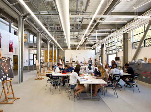Painting studio is filled with north light, and open to the gallery via sectional overhead doors.