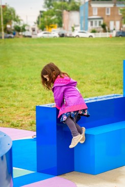 On each of the seating structures is a question prompting reflection and conversation. 