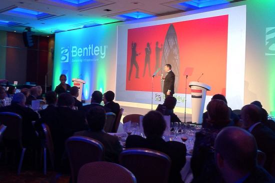 Chris
 Barron, Bentley's senior vice president of corporate marketing, opened 
the Be Inspired awards program with a tune that linked London, James 
Bond, and infrastructure.