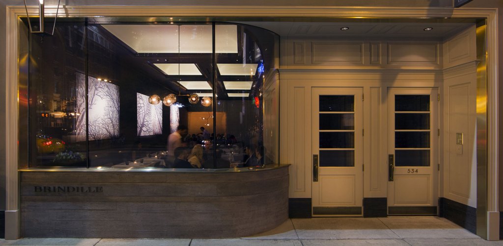 Brindille’s curved fa&ccedil;ade lends to subdued, intimate interior that complements the restaurant’s namesake tree-branch theme.