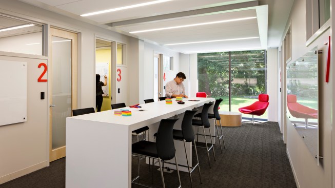 Project rooms are grouped around a shared collaborative area