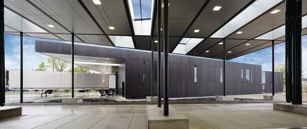 A+truck+moves+through+the+commercial+traffic+checkpoint+under+the+canopy+at+the+new+U.S.+Land+Port+of+Entry+in+Van+Buren%2c+Maine.
