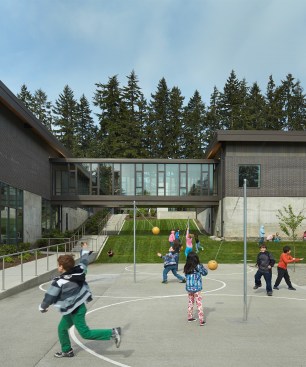 The+playground+is+located+in+the+front+of+the+school%2c+encouraging+public+use.