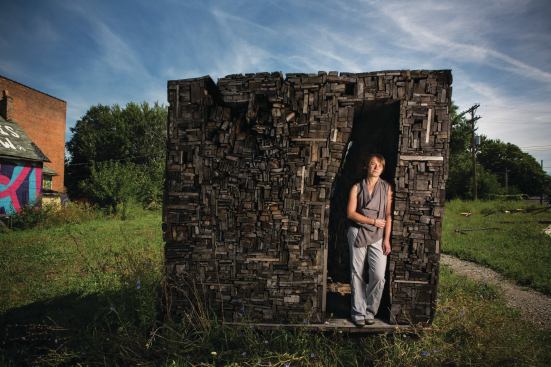 Catie Newell, founder of Alibi Studio and a 2013 Rome Prize winner, poses inside her "Salvaged Landscape" installation in Detroit.