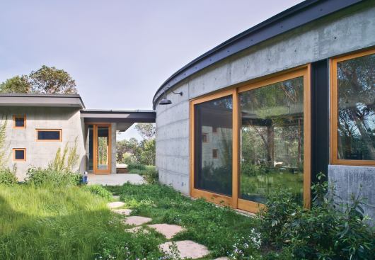 Translucent canopies link the building's three pavilions.