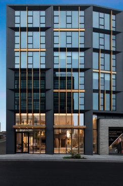 Wrapped in glazing, J Linea’s double-height lobby is visible from the exterior to create a connection with the streetscape.