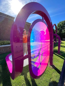 The panels reflect and refract various colors based on the angle in which the light hits the work. 