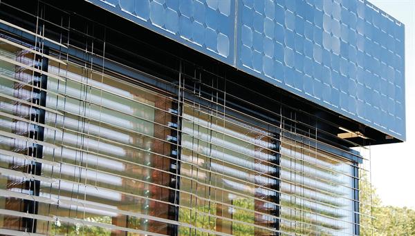 Close-up of shade and vertical photovoltaic systems.