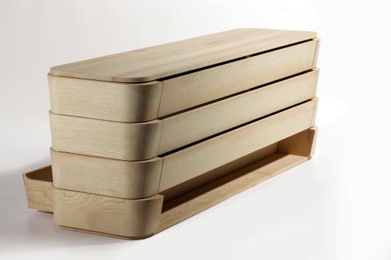 At the "Nouvelle Vague" exhibition, Parisian studio A+A Cooren's Yaban&eacute; dresser featured rounded corners and long, shinglelike, two-direction drawers. 
aplusacooren.com