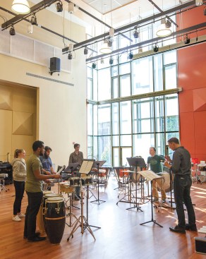 The Instrument Rehearsal Hall's
towering window offers views of the campus and makes it a popular venue for community events.