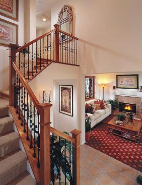 A double-story entry with a window allows the compact interior to appear more expansive.