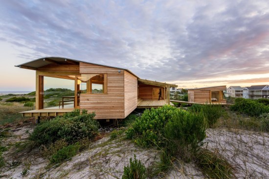 The volumes hover above the landscape allowing the indigenous vegetation to take hold beneath. The
owners are actively involved with rehabilitation and protection of the surrounding dunescape assisting
conservationists