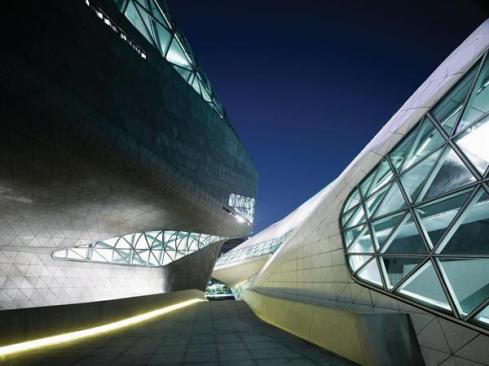 The paths continue through the site and between the two buildings, in a circulation network dotted by pools and plazas.