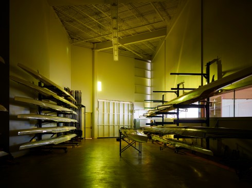 The Boat Storage Room is lighted as if the space is a pinhole camera.  One gold 
“note” illuminates the entire space. “Notes” appear, move, change and disappear during the day capturing the kinetic energy within the space.

