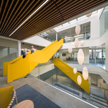 As Okland’s logo is yellow the color was used sparingly, apart from the main circulation stair where concrete risers are enclosed in lacquered yellow steel, indicative of construction vehicles.