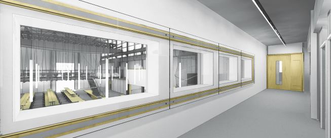 An enclosed hallway at one end of the high-bay studio space connects flanking bands of two-story spaces, which are now used as classrooms, offices, and galleries.