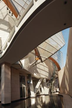 The outdoor grotto level is defined by terraces, pools, and pathways. Bridges overhead provide access 

to the main entrances at the ground level.