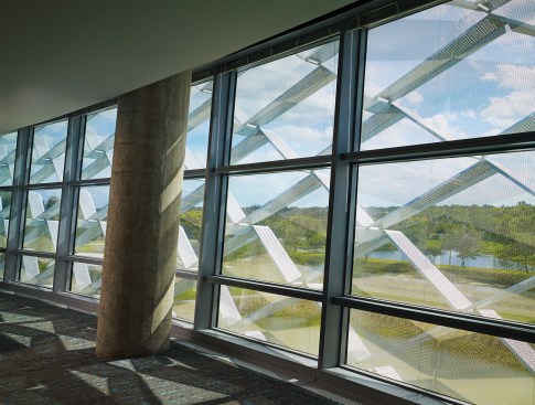 Perimeter circulation on an office floor, with view of sunshade system
