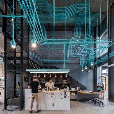 Coffee bar and gathering area just inside entrance
