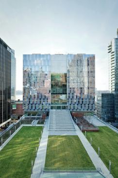 An amphitheater that descends from the tower radiates with recessed 13W PL-C CFLs arranged in a pattern similar to the ceiling of the cascade.