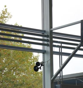 A camera positioned inside a building.