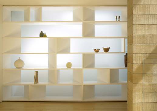 The "light shelf" draws luminescence from a skylight that opens to the building's common area.